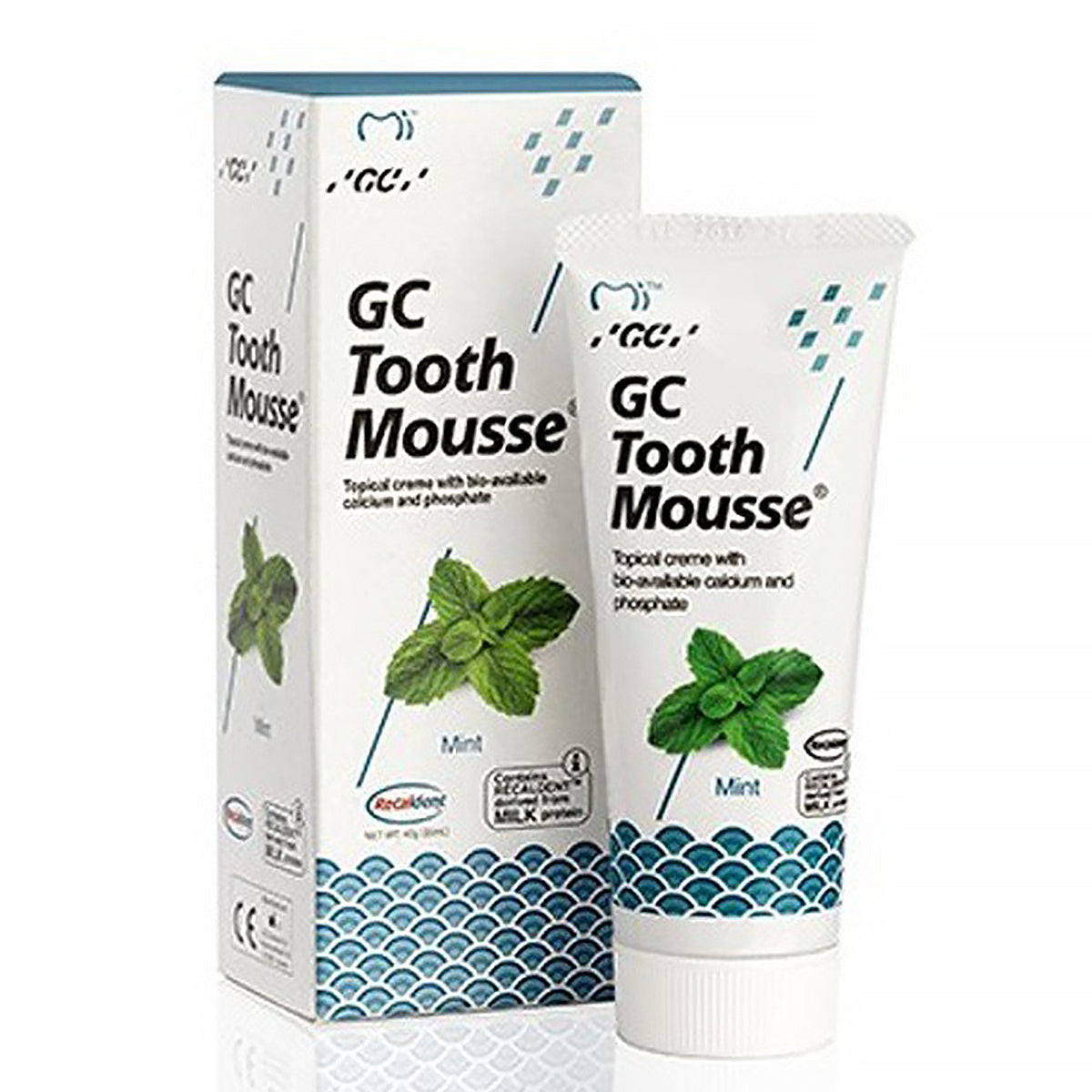 GC Tooth Mousse Mint tube naast verpakking met muntblaadjes afbeelding