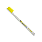 Lactona tandenborstel Toby Fruity met witte steel en gele haren
