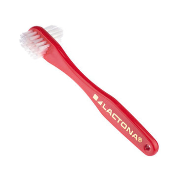 Lactona Prothese tandenborstel rood met witte haren, close-up op witte achtergrond