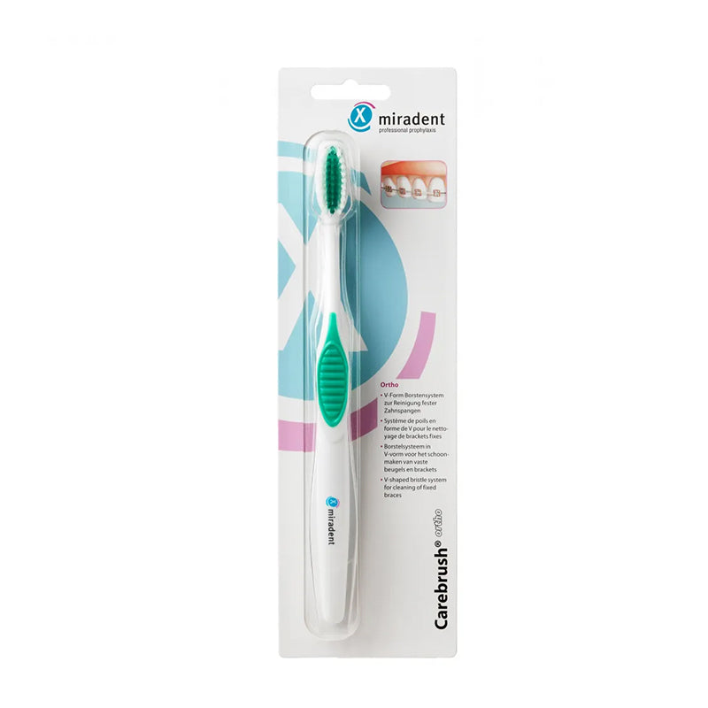 Miradent Carebrush Ortho v-vorm tandenborstel in verpakking met witte handgreep en groene kop