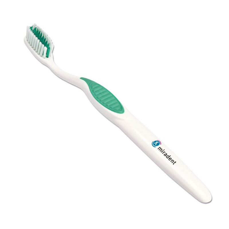 Miradent Carebrush Ortho v-vorm tandenborstel met witte greep en groene rubberen duimsteun