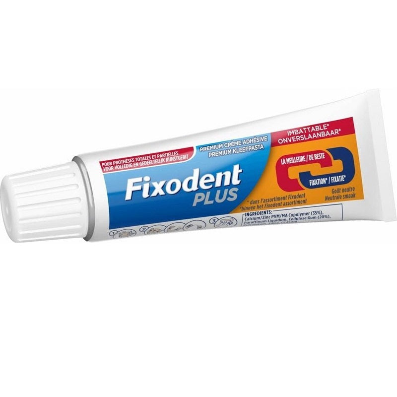 Fixodent Plus Dual Power kleefpasta tube liggend met dop, close-up van verpakking