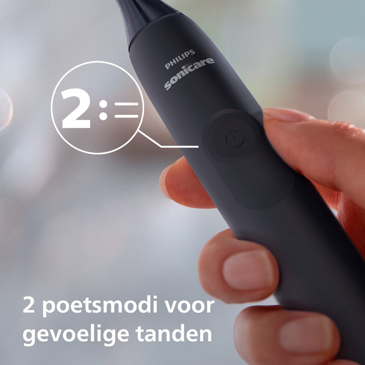 Sonicare 4100 elektrische borstel zwart, hand met tekst 2 poetsmodi voor gevoelige tanden