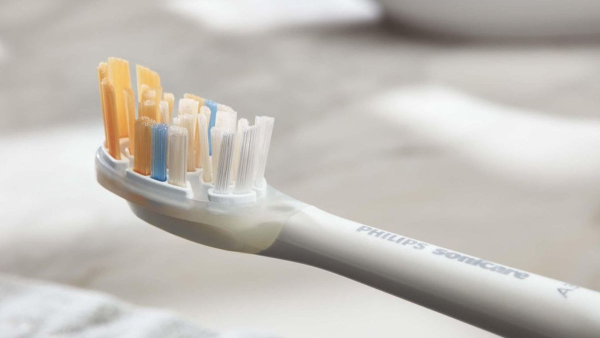 Sonicare A3 Premium AIO opzetborstel close-up van verkleurde borstelharen als vervangingsindicator