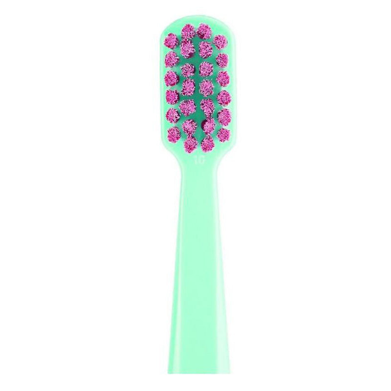 Curaprox Tandenborstel CS SMART ultra soft close-up van roze borstelharen op mintgroen handvat
