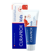 Curaprox Kinder tandpasta aardbei zonder fluoride, tube naast verpakking met krab