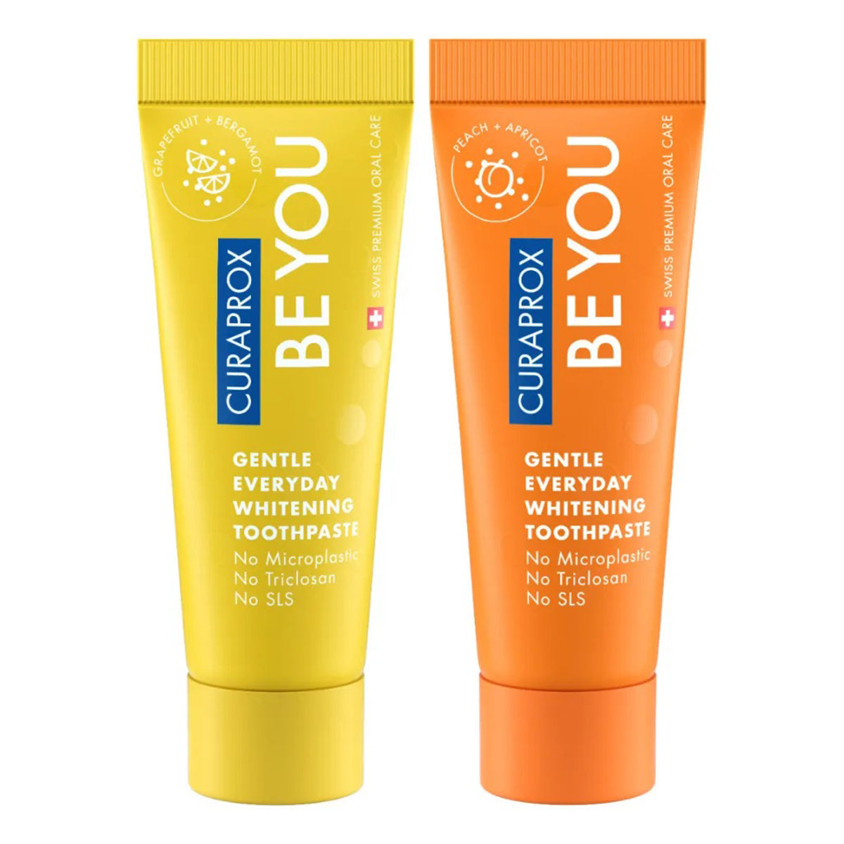 Curaprox BE YOU tandpasta tubes in geel en oranje naast elkaar