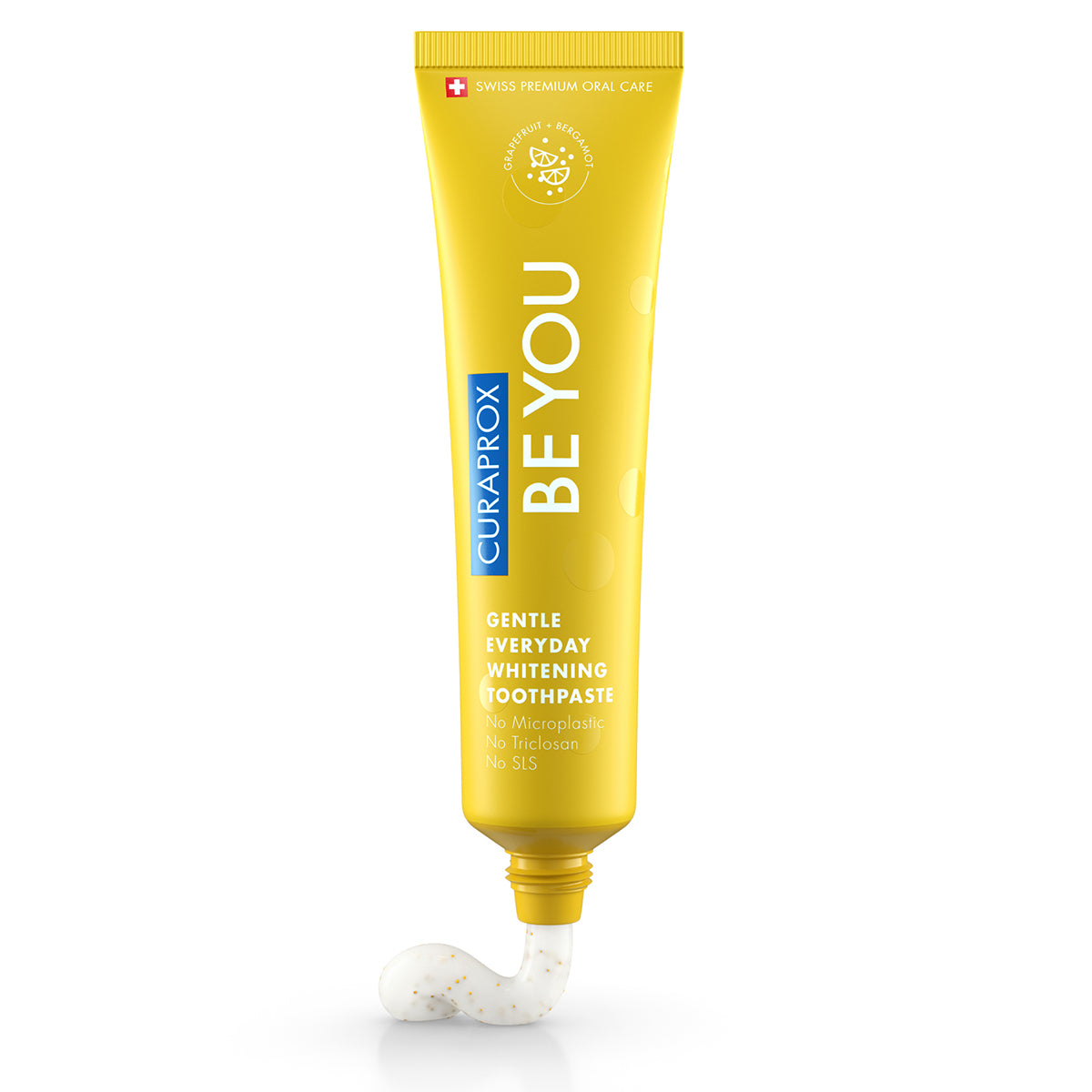 Curaprox BE YOU tandpasta grapefruit/bergamot met witte gel uit tube geknepen