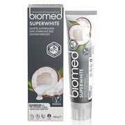 Biomed superwhite tandpasta verpakking en tube met kokosnoot afbeelding