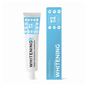 Woom Family tandpasta Whitening tube en verpakking naast elkaar