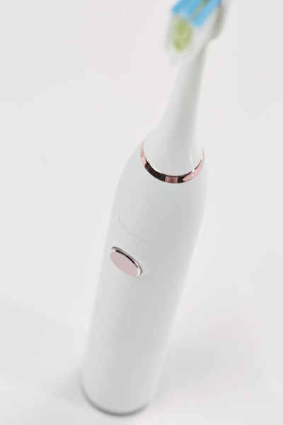 Bluem Sonic+ elektrische tandenborstel wit met roségouden accent detailopname