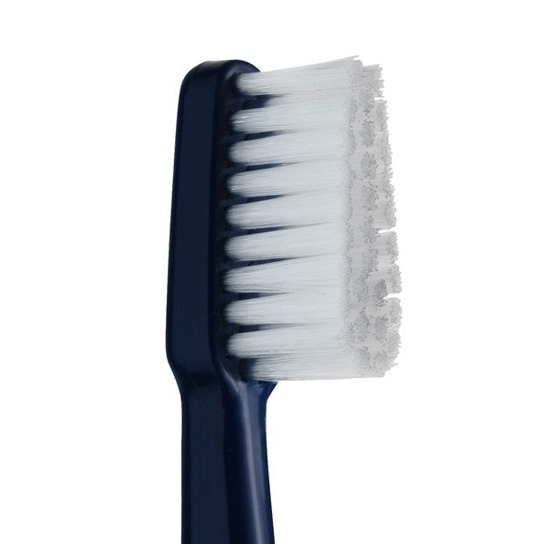 Tepe Tandenborstel Select Compact X-soft detailopname van blauwe borstelkop met witte haren