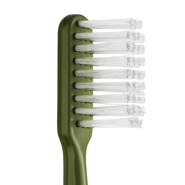 TePe Prothese tandenborstel groen close-up van witte borstelharen