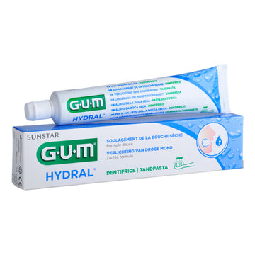GUM Hydral tandpasta verpakking en tube naast elkaar tegen witte achtergrond