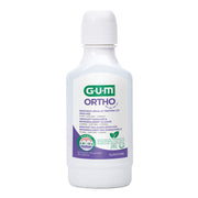 GUM Ortho mondspoelmiddel witte fles met paars-groen etiket en dop