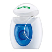 GUM Easy Floss dispenser met wit-blauwe behuizing en tandzijde zichtbaar
