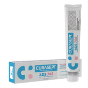 Curasept ADS 705 Gel-Tandpasta verpakking en tube naast elkaar, 75 ml